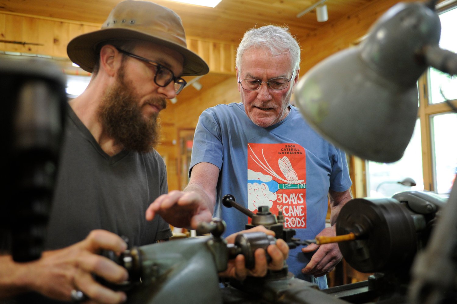 A lost art lives. Master bamboo rod maker and noted fishing guide (Ret.) Mike Canazon of Livingston Manor, NY, works with John Flynn of Downsville, NY, to fashion a split cane bamboo fly rod. The Catskill Fly Fishing Center & Museum offers classes in the almost-lost art...